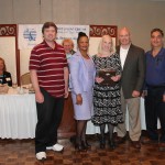 Staff from Medtronic. Inc receiving The Distinguished Employer of the Year by MRC Salem Area Director Teury Marte