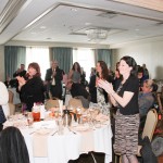 Legislative Breakfast attendees giving standing ovation for award recipients